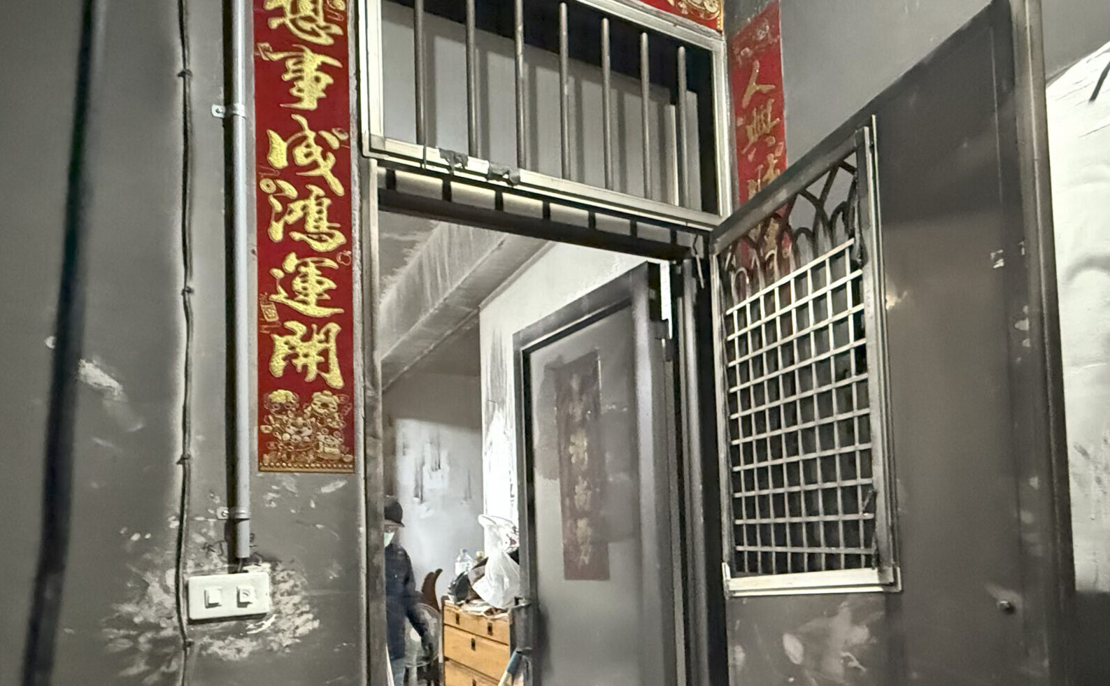 Traditional iron door blackened by smoke